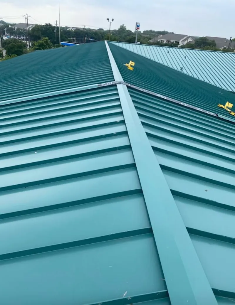Green commercial metal roof ridge and valley for Metal Roof Repair in North Fond du Lac