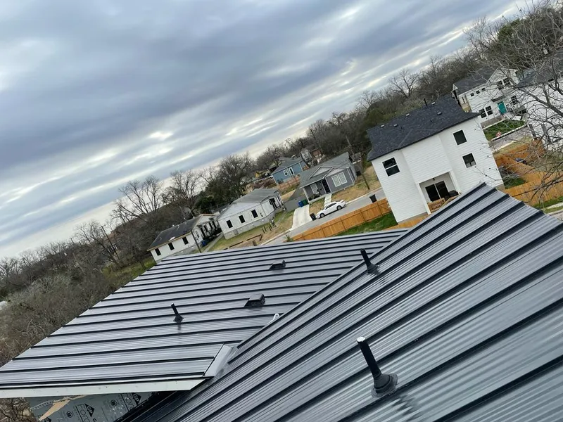 Standing seam metal roof panels with vents for Skylight Repair in North Fond du Lac